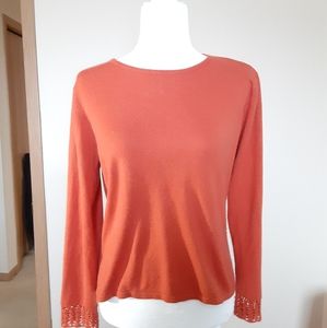 Vintage looking orange sweater